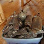 Glass bottles unearthed while working with the geothermal system.